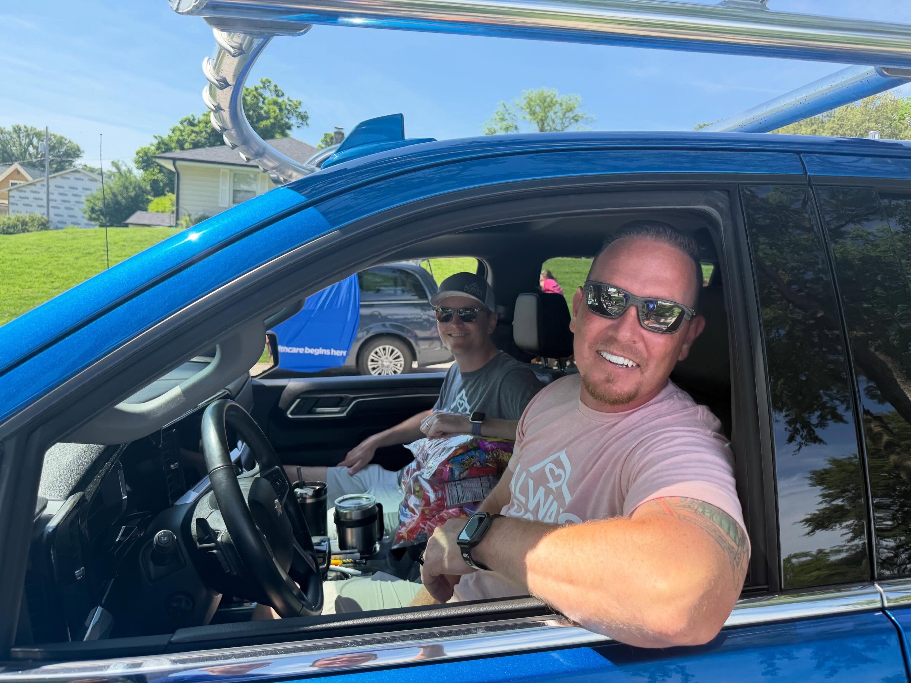 An Always Roofing team member behind the wheel of the company truck